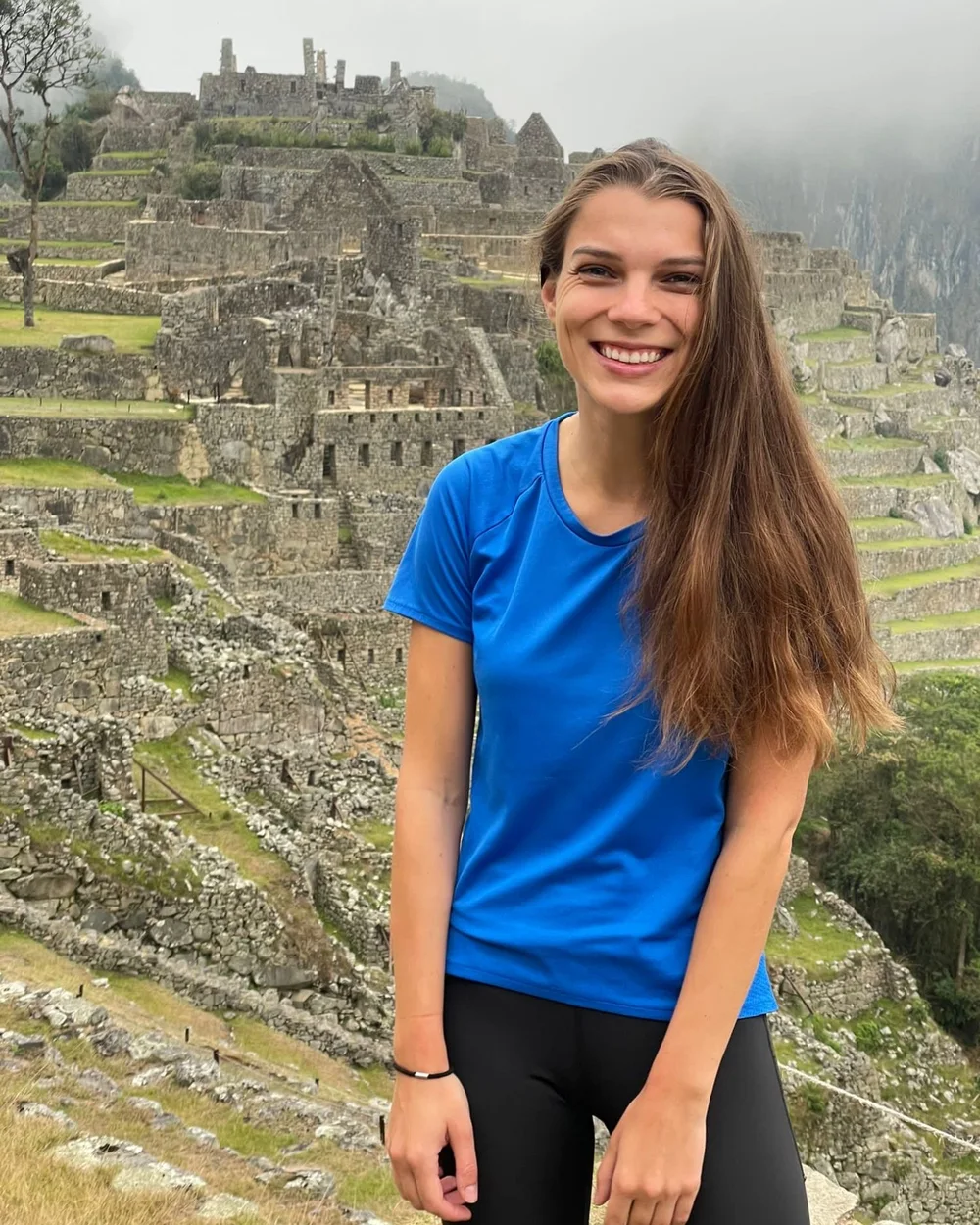 Greta smiling at Machu Picchu